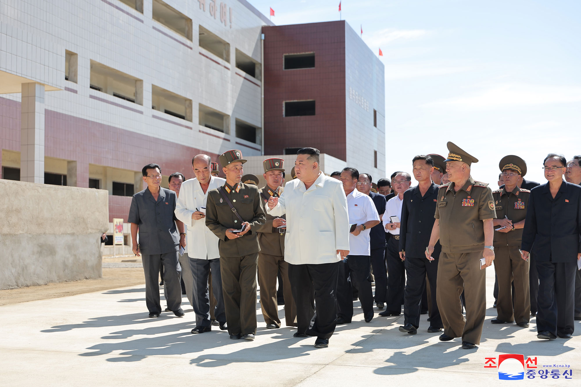 President of State Affairs Kim Jong Un gives field guidance at regional-industry factories under construction in 
Hamju County