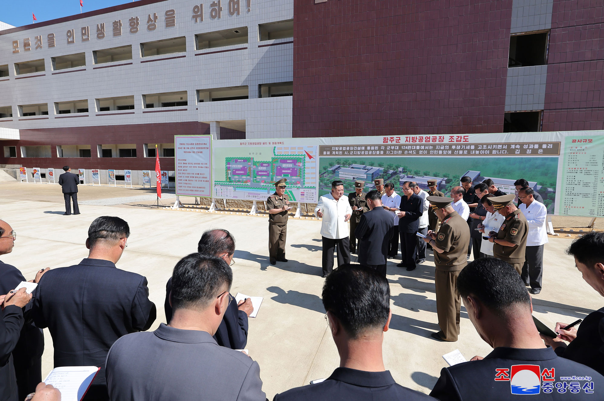 President of State Affairs Kim Jong Un gives field guidance at regional-industry factories under construction in 
Hamju County