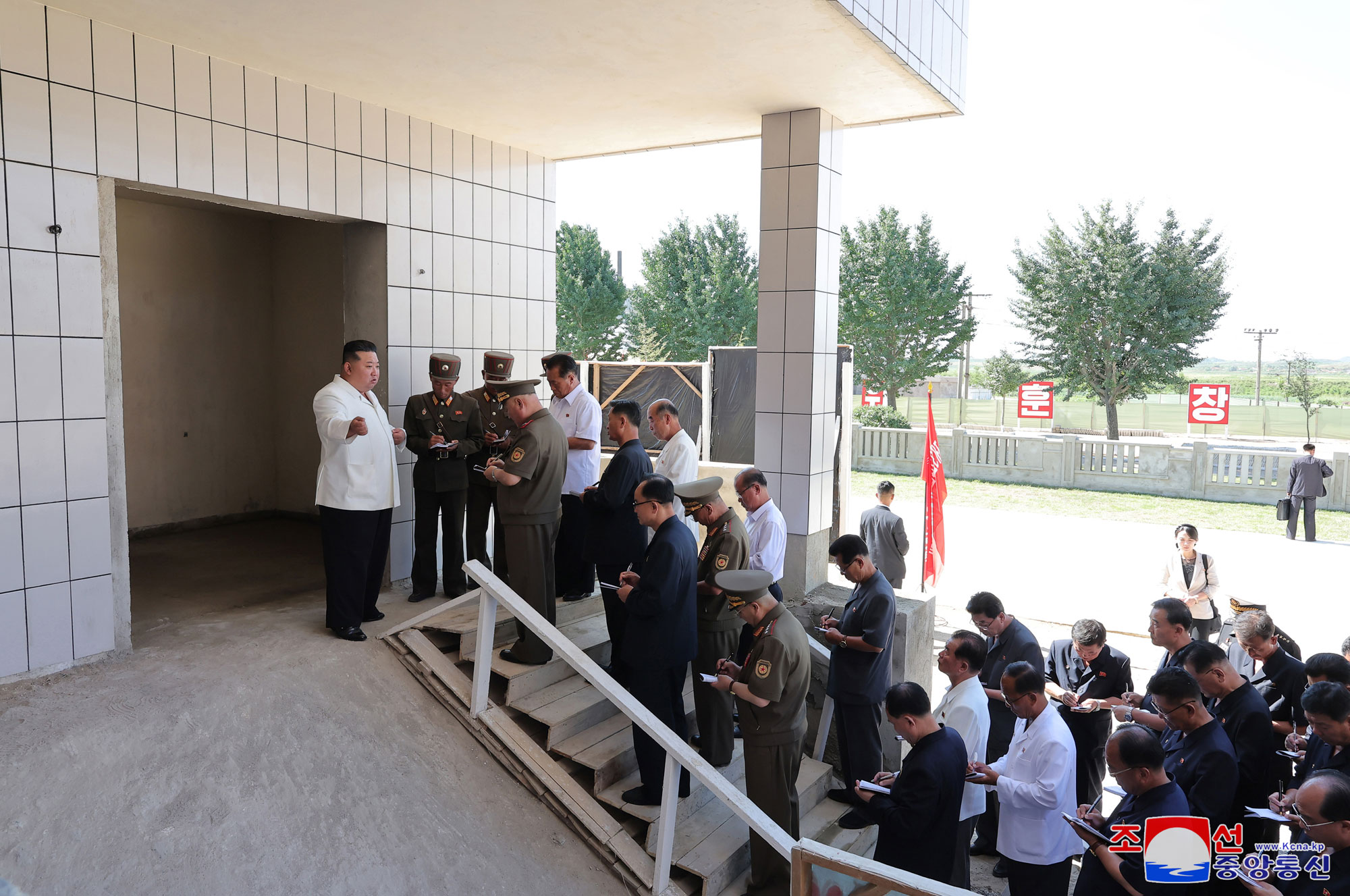 President of State Affairs Kim Jong Un gives field guidance at regional-industry factories under construction in 
Hamju County