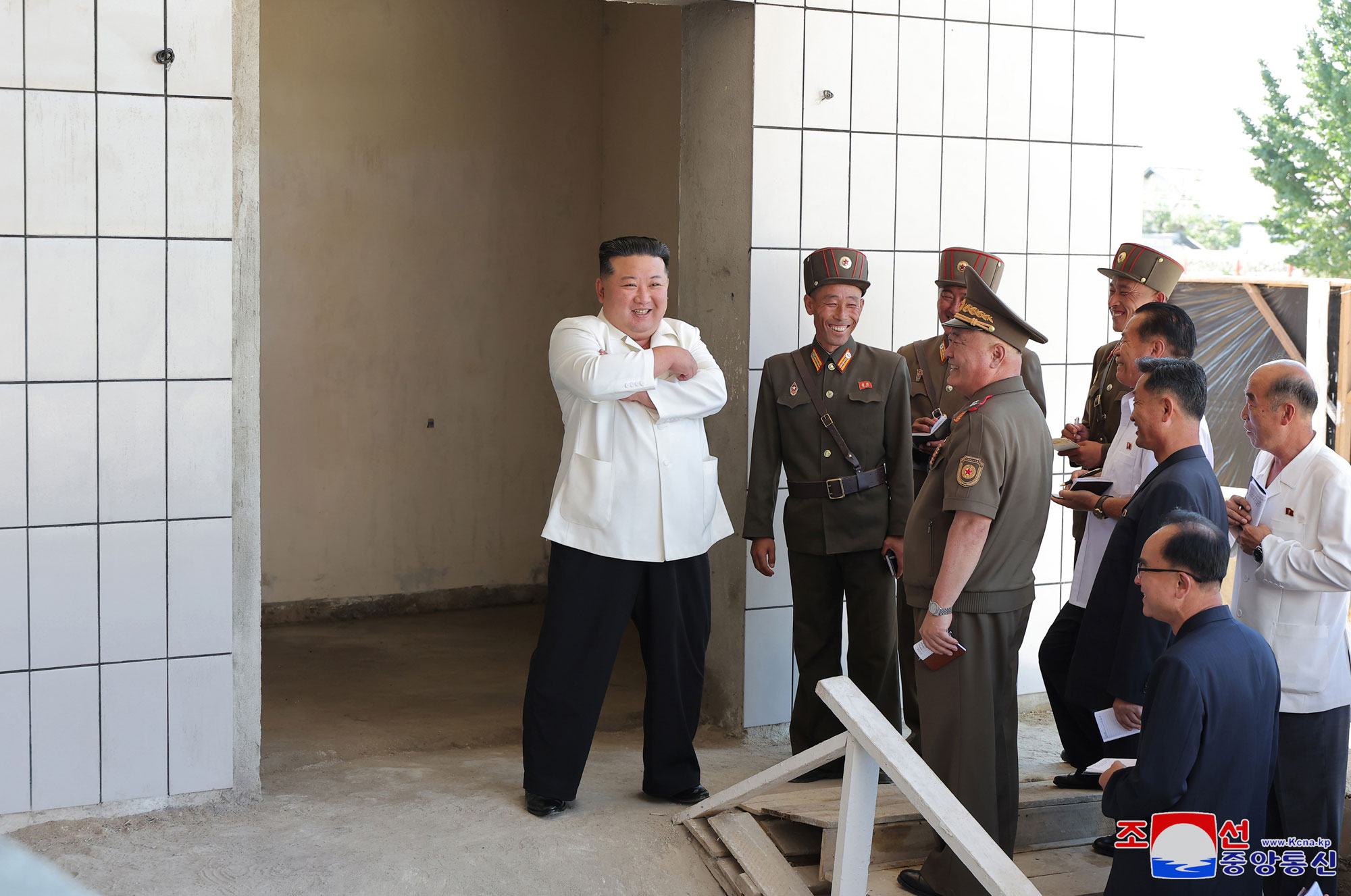 President of State Affairs Kim Jong Un gives field guidance at regional-industry factories under construction in 
Hamju County