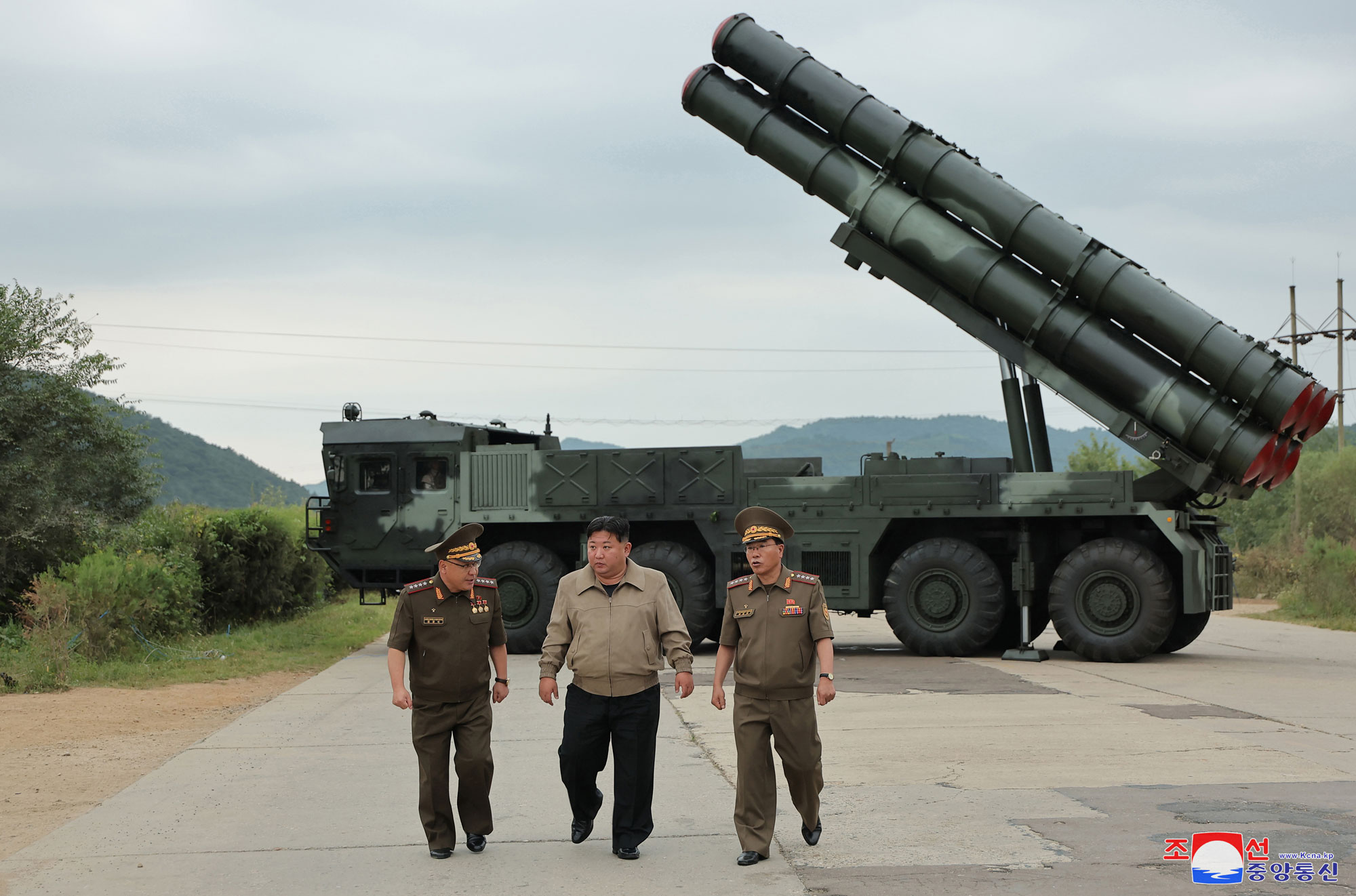 President of State Affairs Kim Jong Un oversees test-fire for verifying performance of new-type 600mm multiple rocket launcher