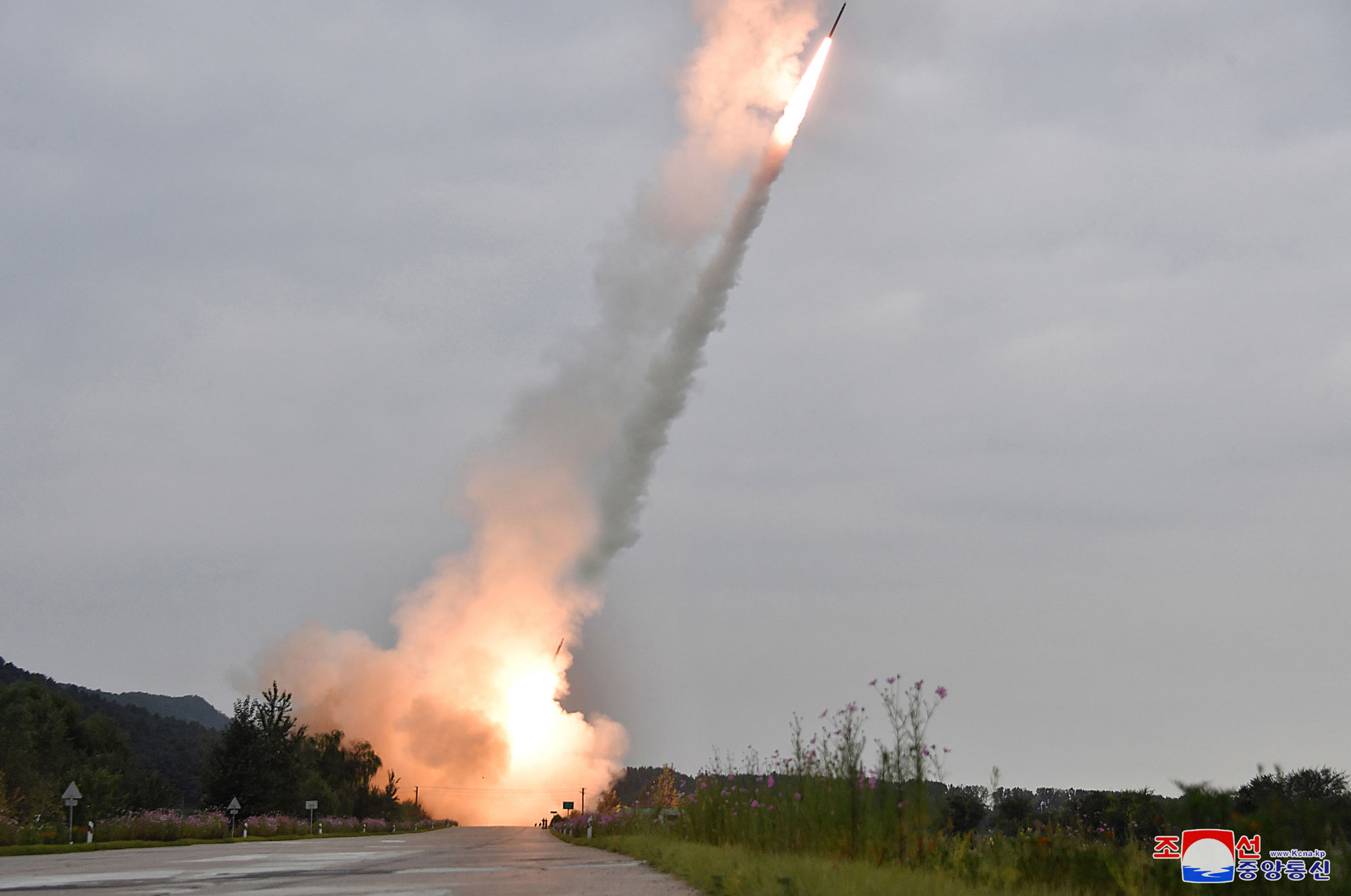 President of State Affairs Kim Jong Un oversees test-fire for verifying performance of new-type 600mm multiple rocket launcher