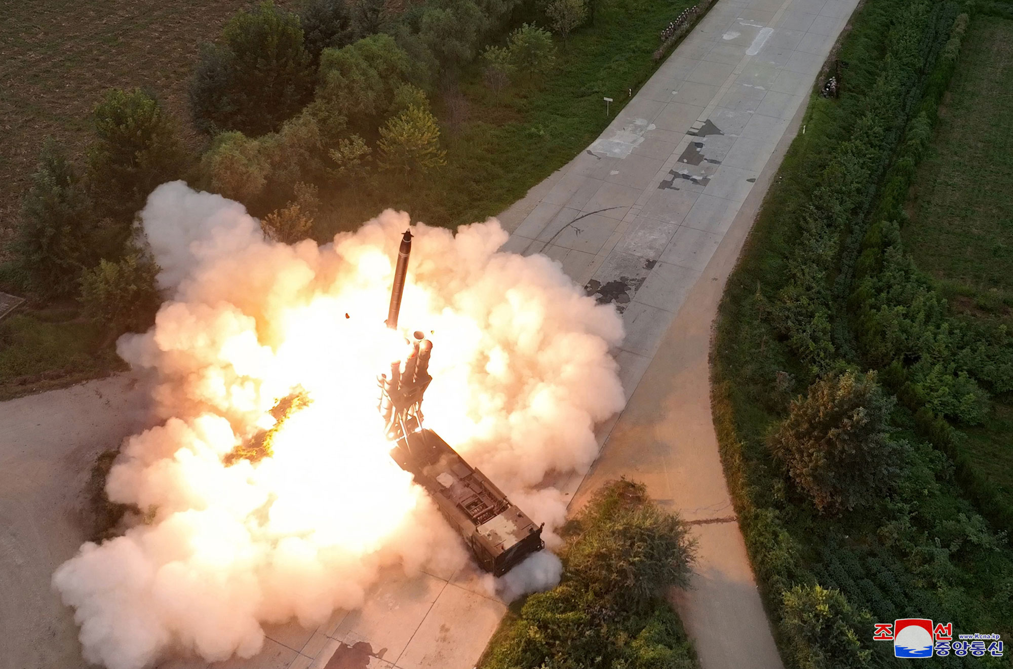 President of State Affairs Kim Jong Un oversees test-fire for verifying performance of new-type 600mm multiple rocket launcher