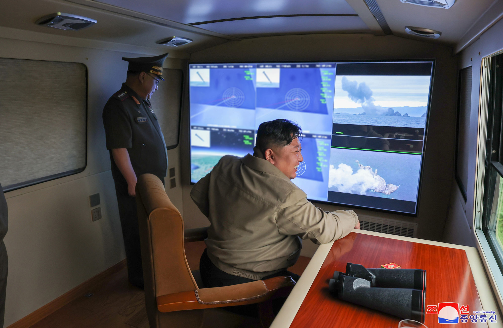 President of State Affairs Kim Jong Un oversees test-fire for verifying performance of new-type 600mm multiple rocket launcher