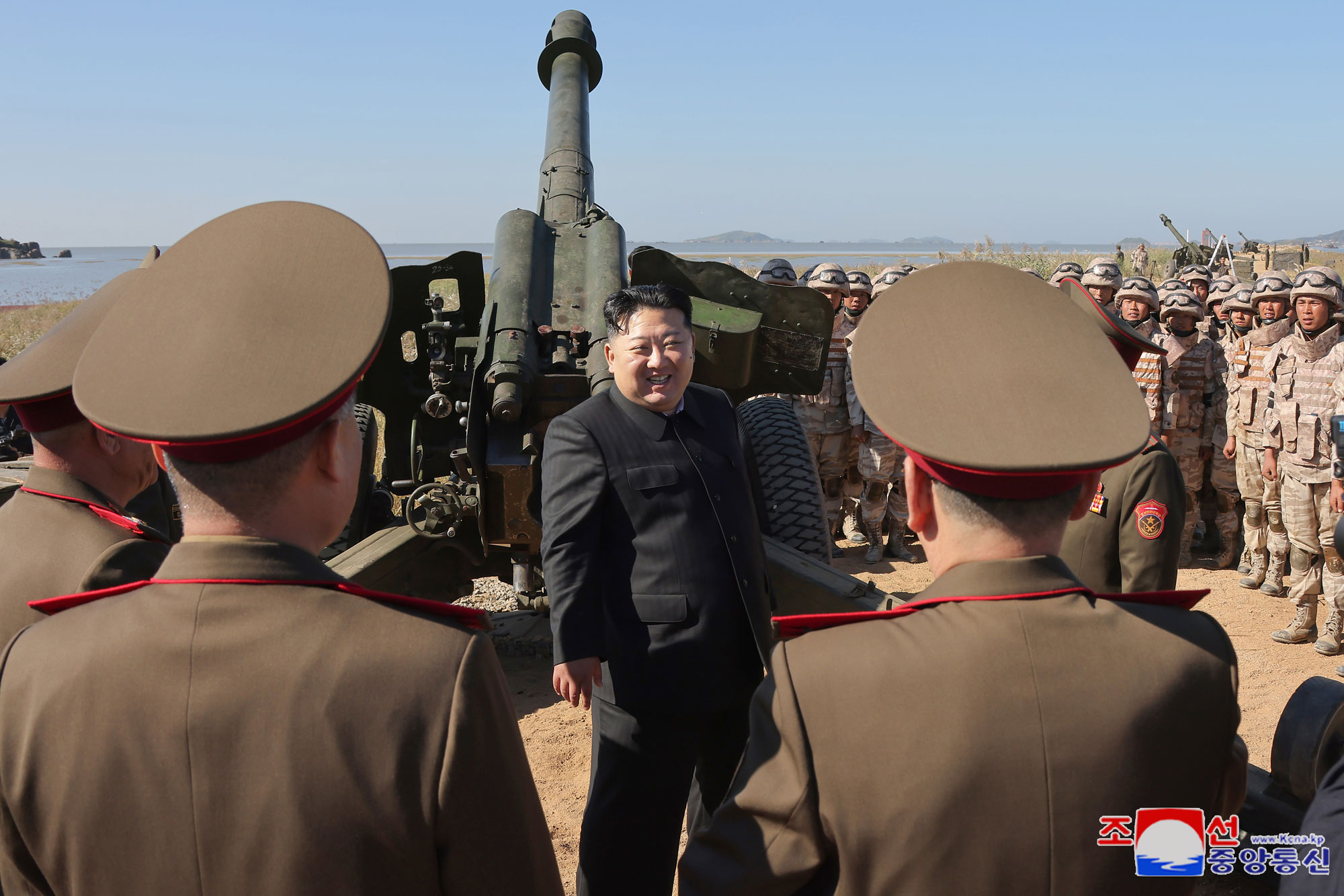 President of State Affairs Kim Jong Un oversees live artillery firing drill of graduates of O Jin U Artillery Academy