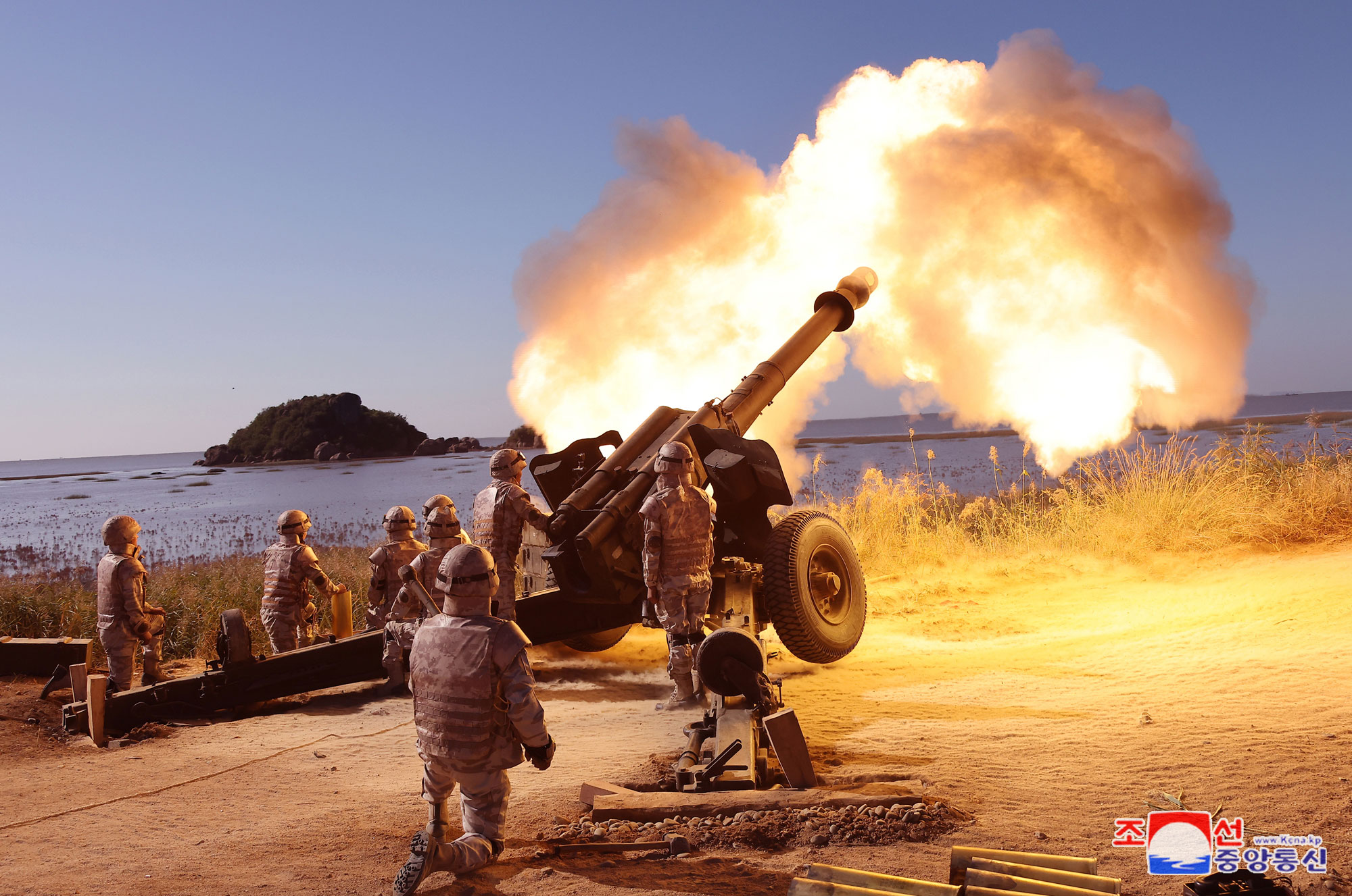 President of State Affairs Kim Jong Un oversees live artillery firing drill of graduates of O Jin U Artillery Academy