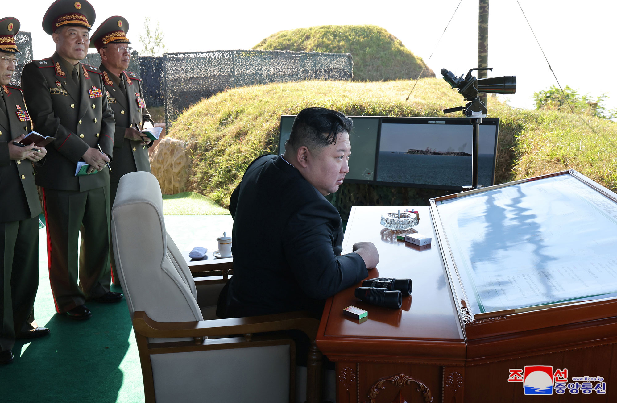 President of State Affairs Kim Jong Un oversees live artillery firing drill of graduates of O Jin U Artillery Academy