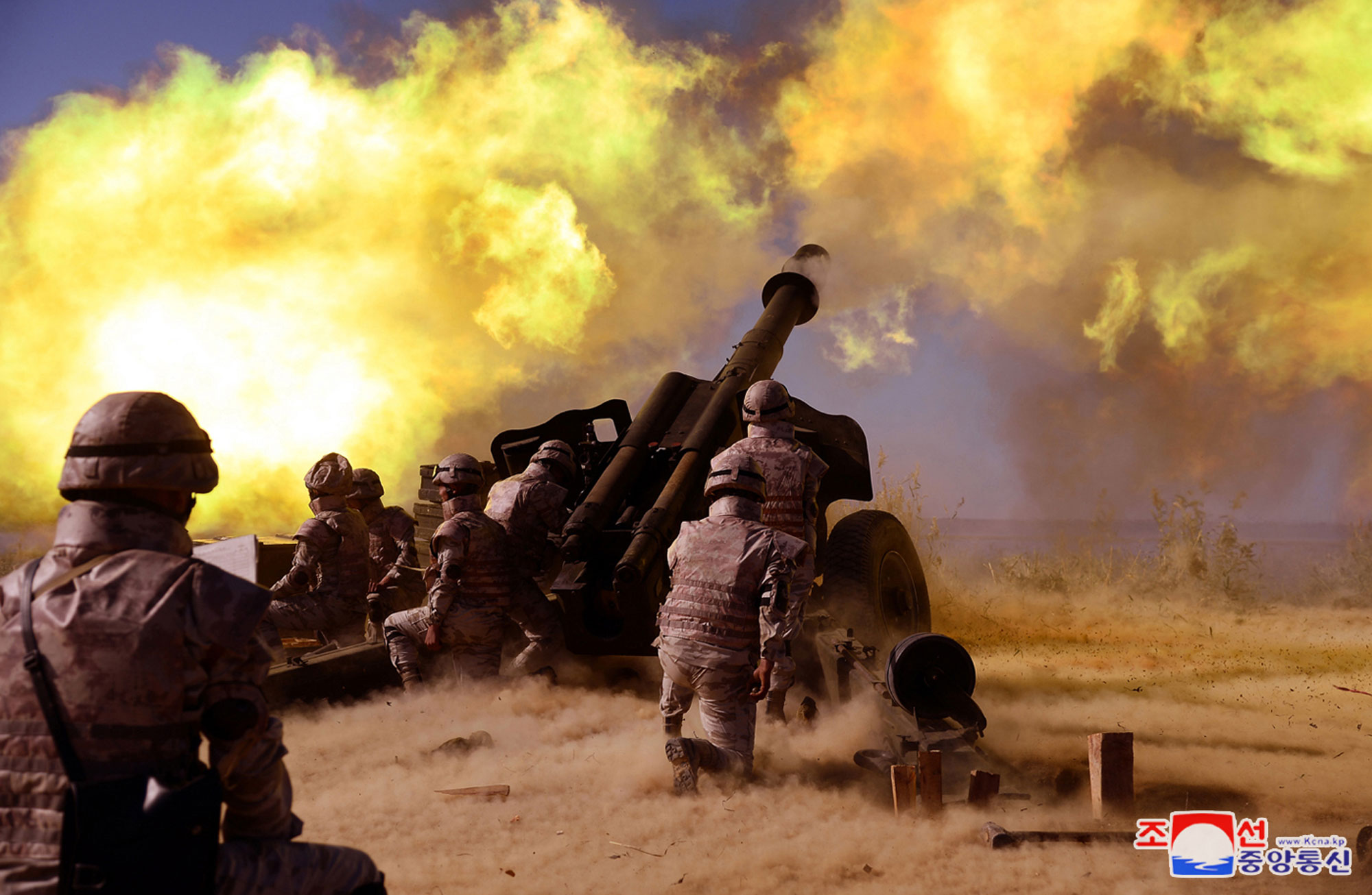 President of State Affairs Kim Jong Un oversees live artillery firing drill of graduates of O Jin U Artillery Academy