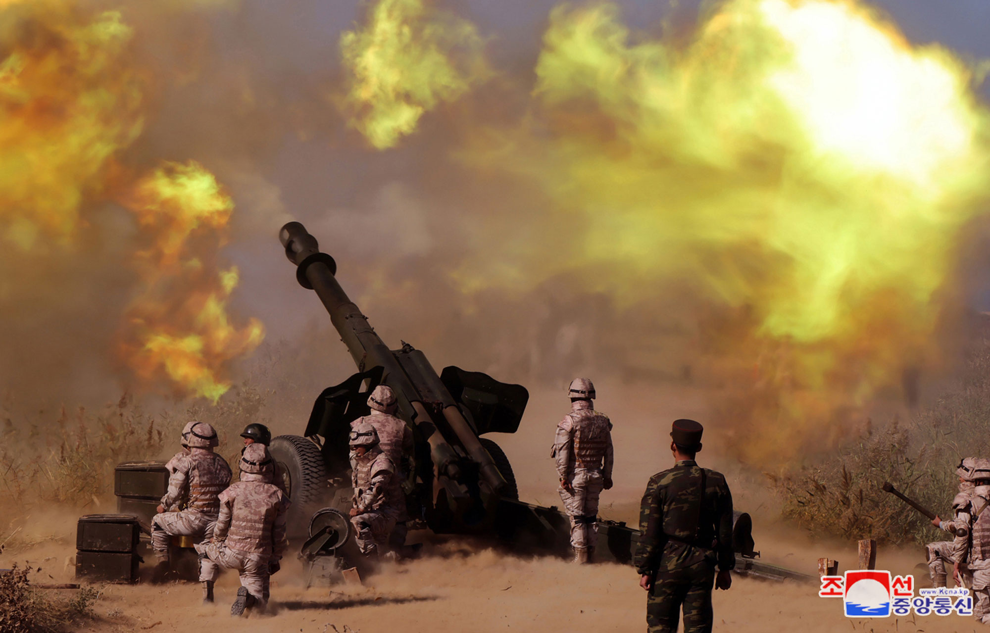 President of State Affairs Kim Jong Un oversees live artillery firing drill of graduates of O Jin U Artillery Academy