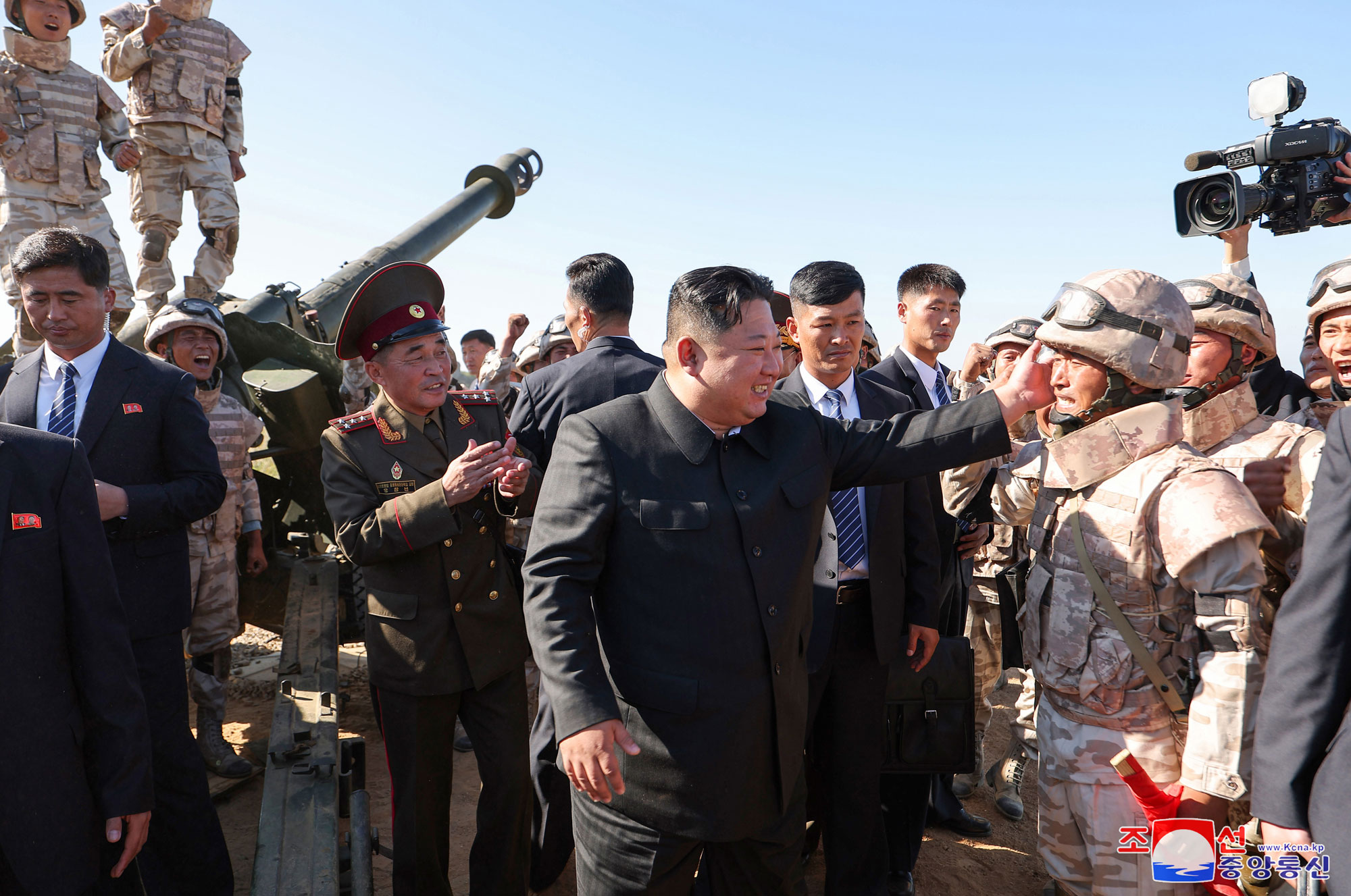 President of State Affairs Kim Jong Un oversees live artillery firing drill of graduates of O Jin U Artillery Academy