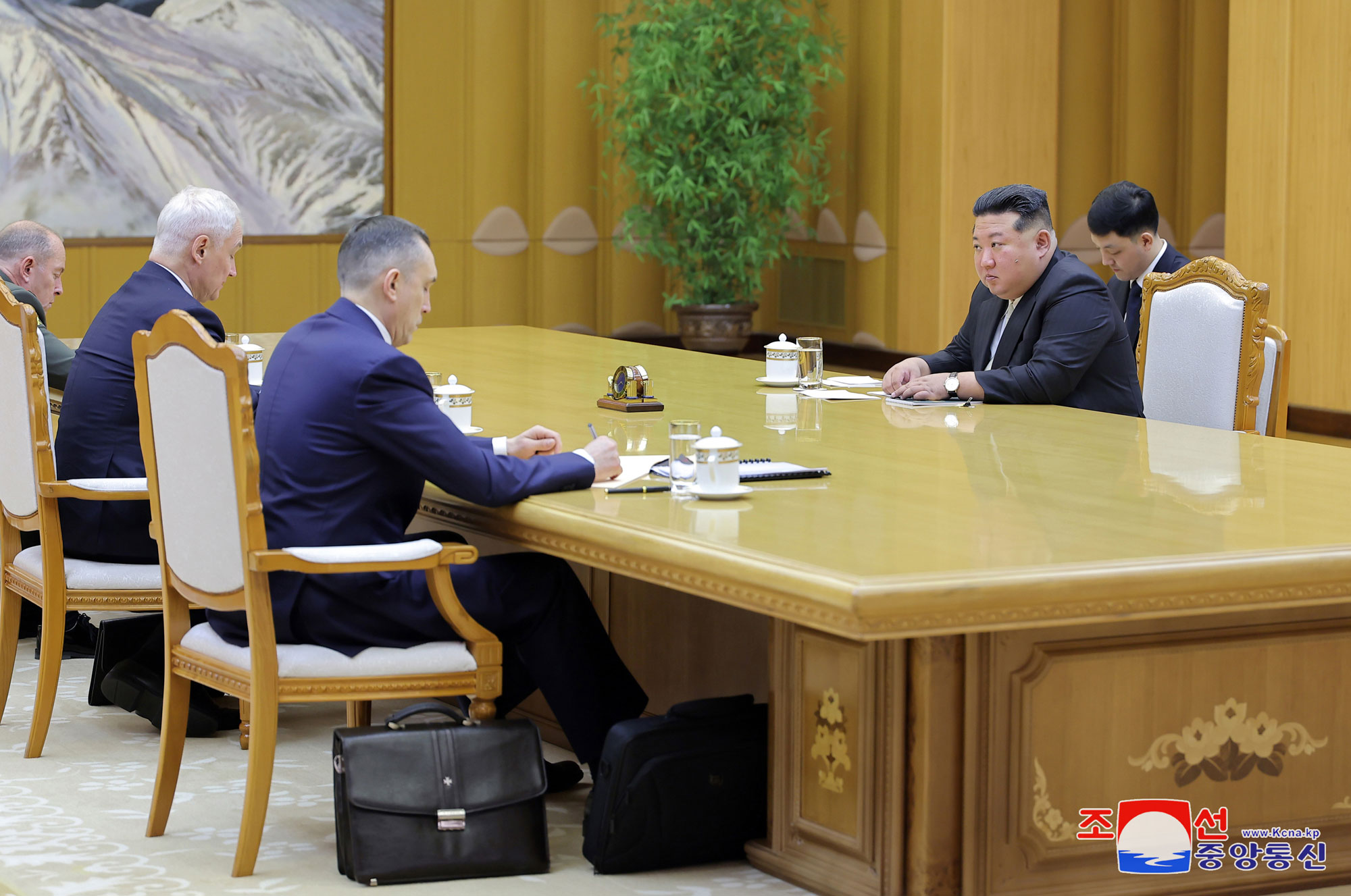 President of State Affairs Kim Jong Un receives Russian Minister of Defence
