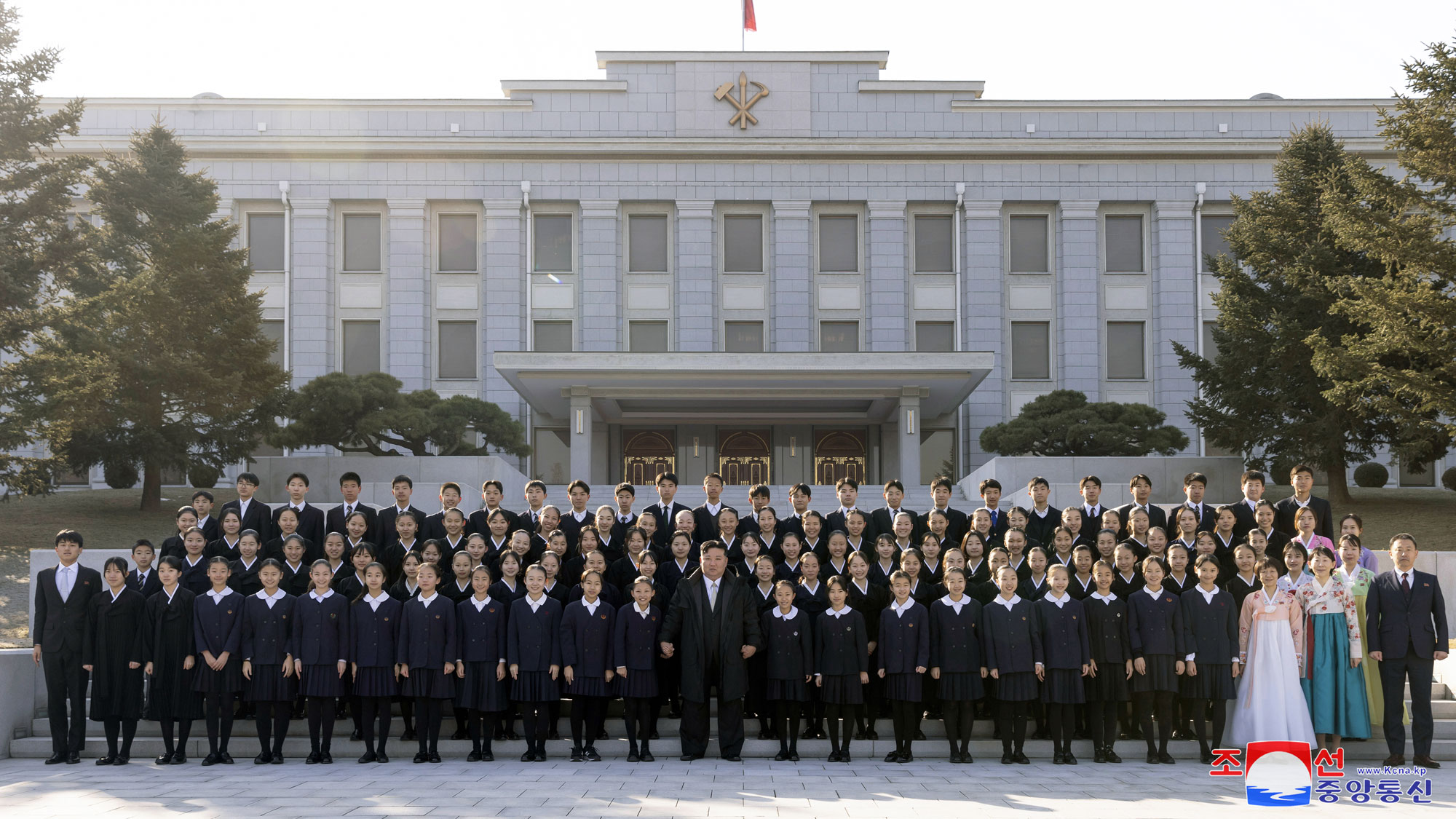 President of State Affairs Kim Jong Un meets members of art troupe of Korean schoolchildren in Japan