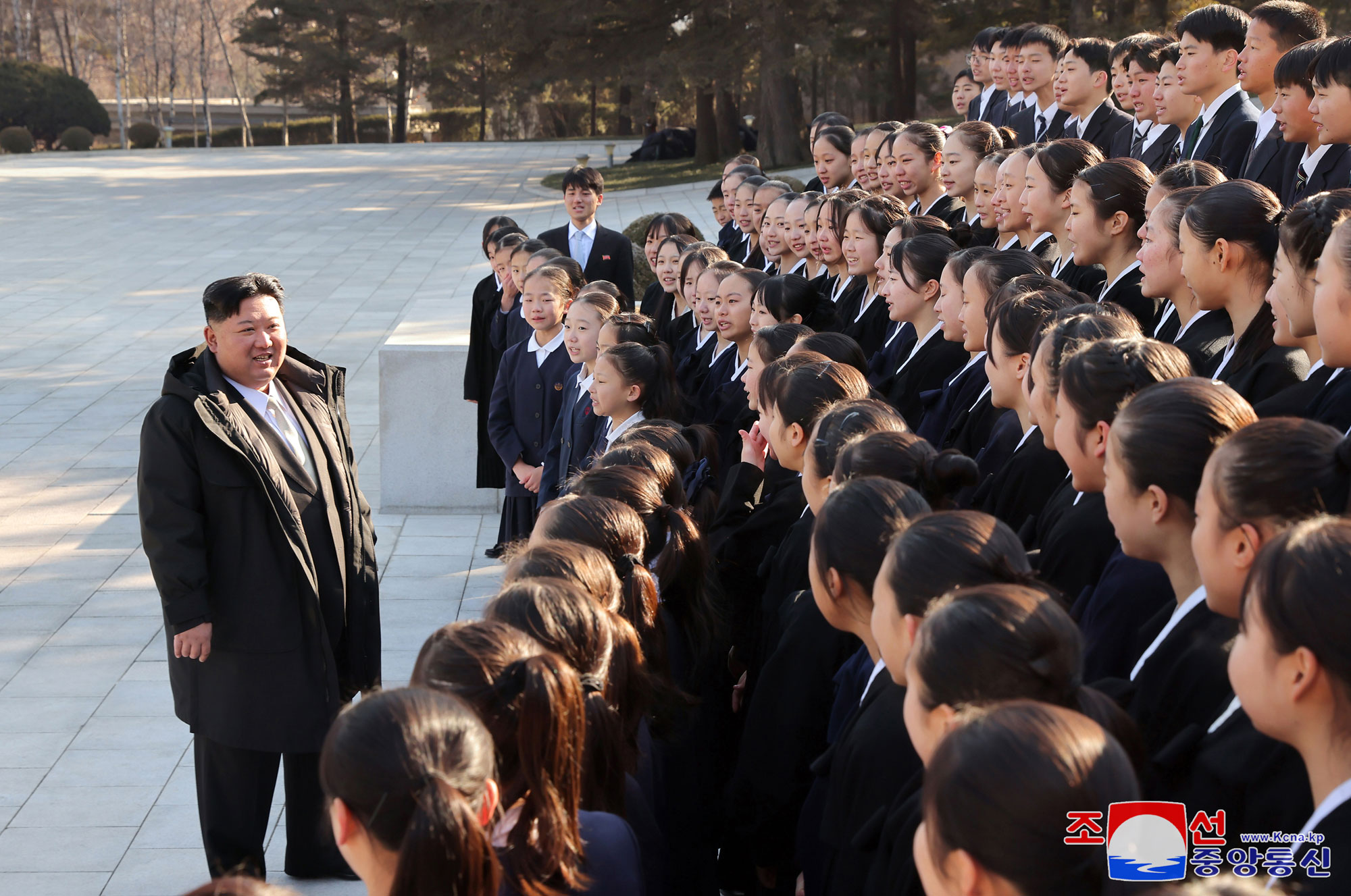 President of State Affairs Kim Jong Un meets members of art troupe of Korean schoolchildren in Japan