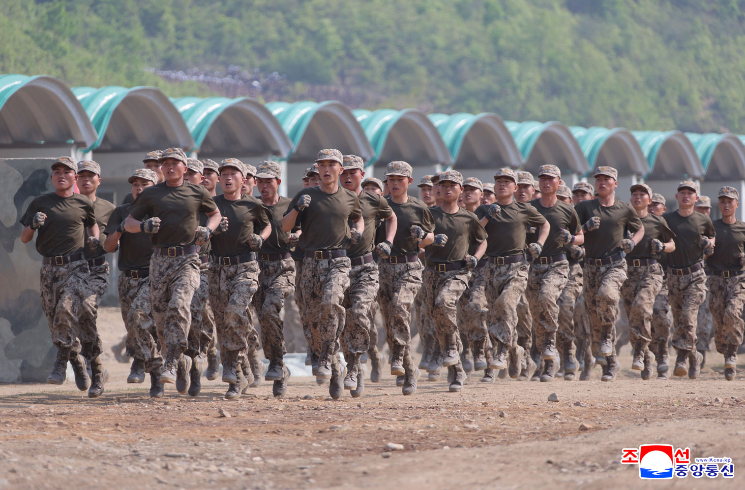 Respected Comrade Kim Jong Un inspects combined tactical drill of different arms conducted under training course of Conference of Training Officers of KPA