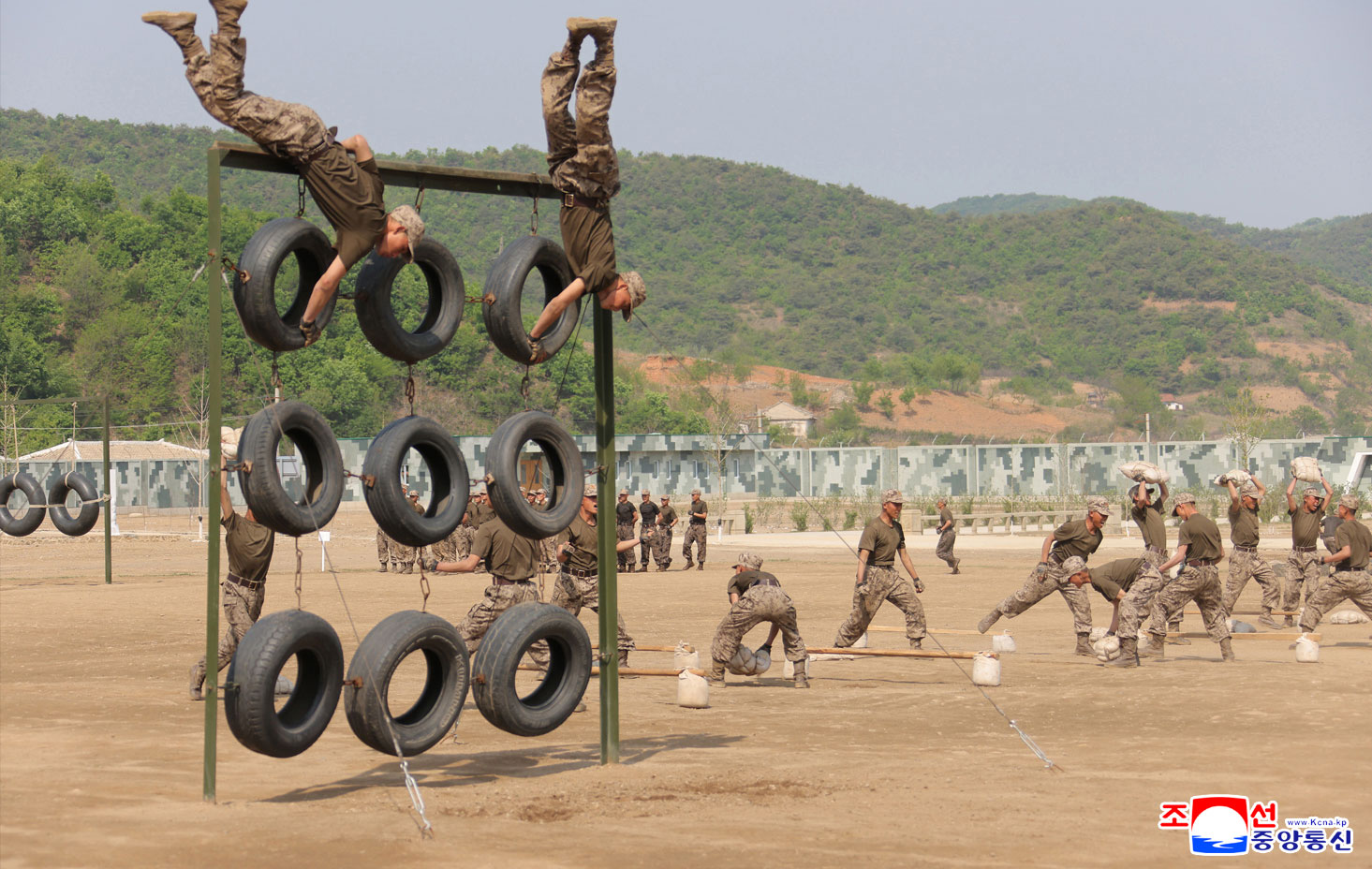 Respected Comrade Kim Jong Un inspects combined tactical drill of different arms conducted under training course of Conference of Training Officers of KPA