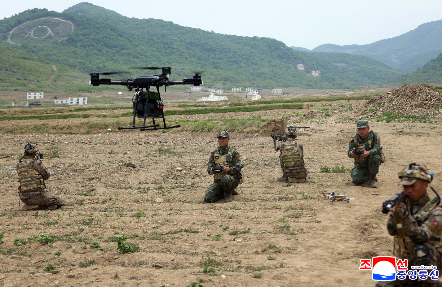 Respected Comrade Kim Jong Un inspects combined tactical drill of different arms conducted under training course of Conference of Training Officers of KPA