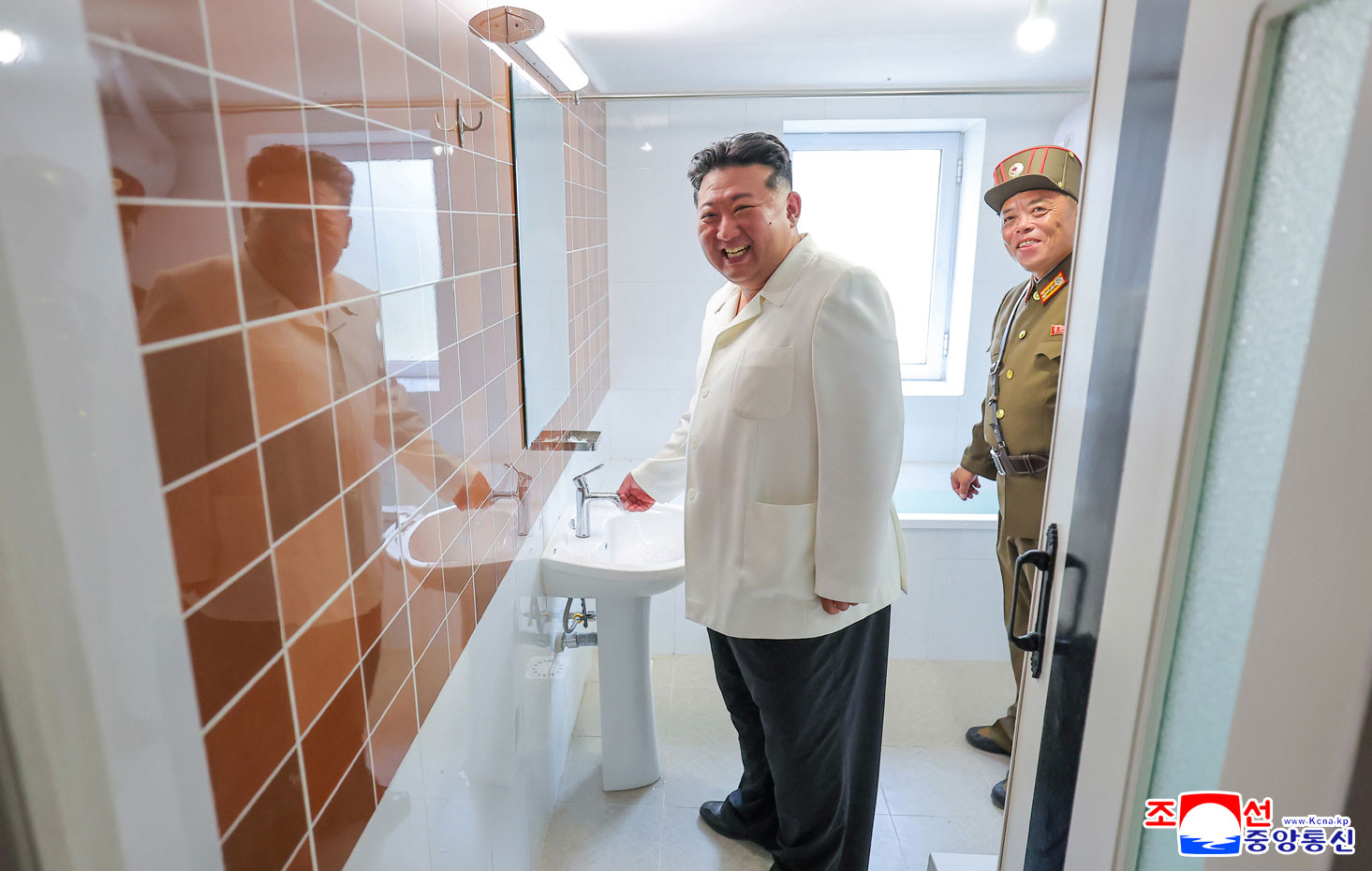 Respected Comrade Kim Jong Un visits construction site of Ragwon County Offshore Farm