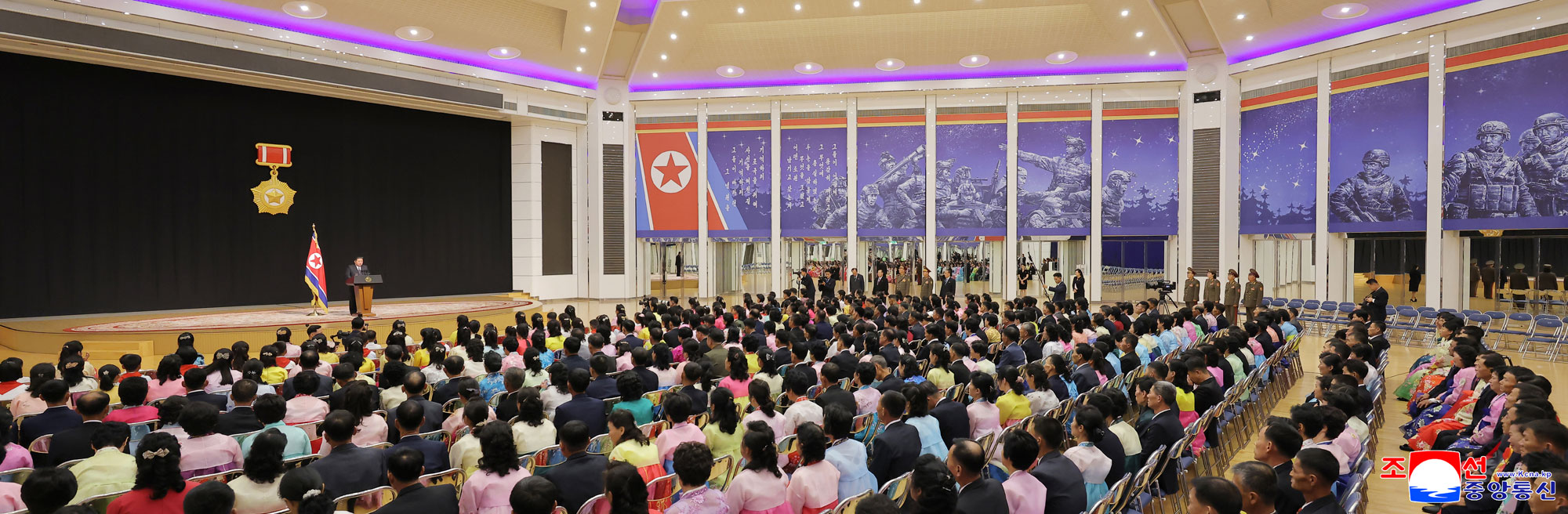 Respected Comrade Kim Jong Un meets bereaved families of martyrs who rendered distinguished services in overseas military operations to console and have photo session with them