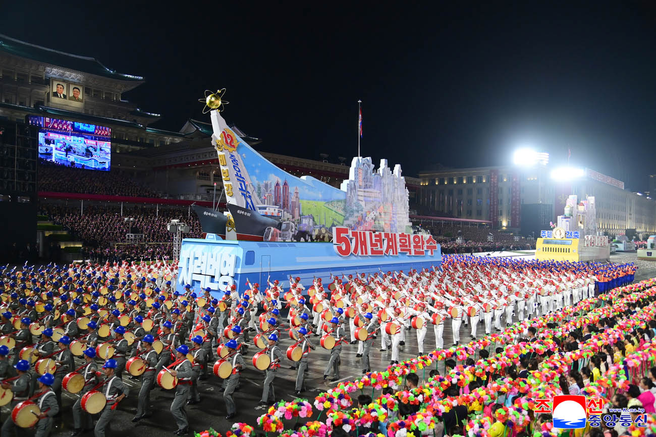 Public procession and torchlight evening gala held to celebrate 80th anniversary of WPK