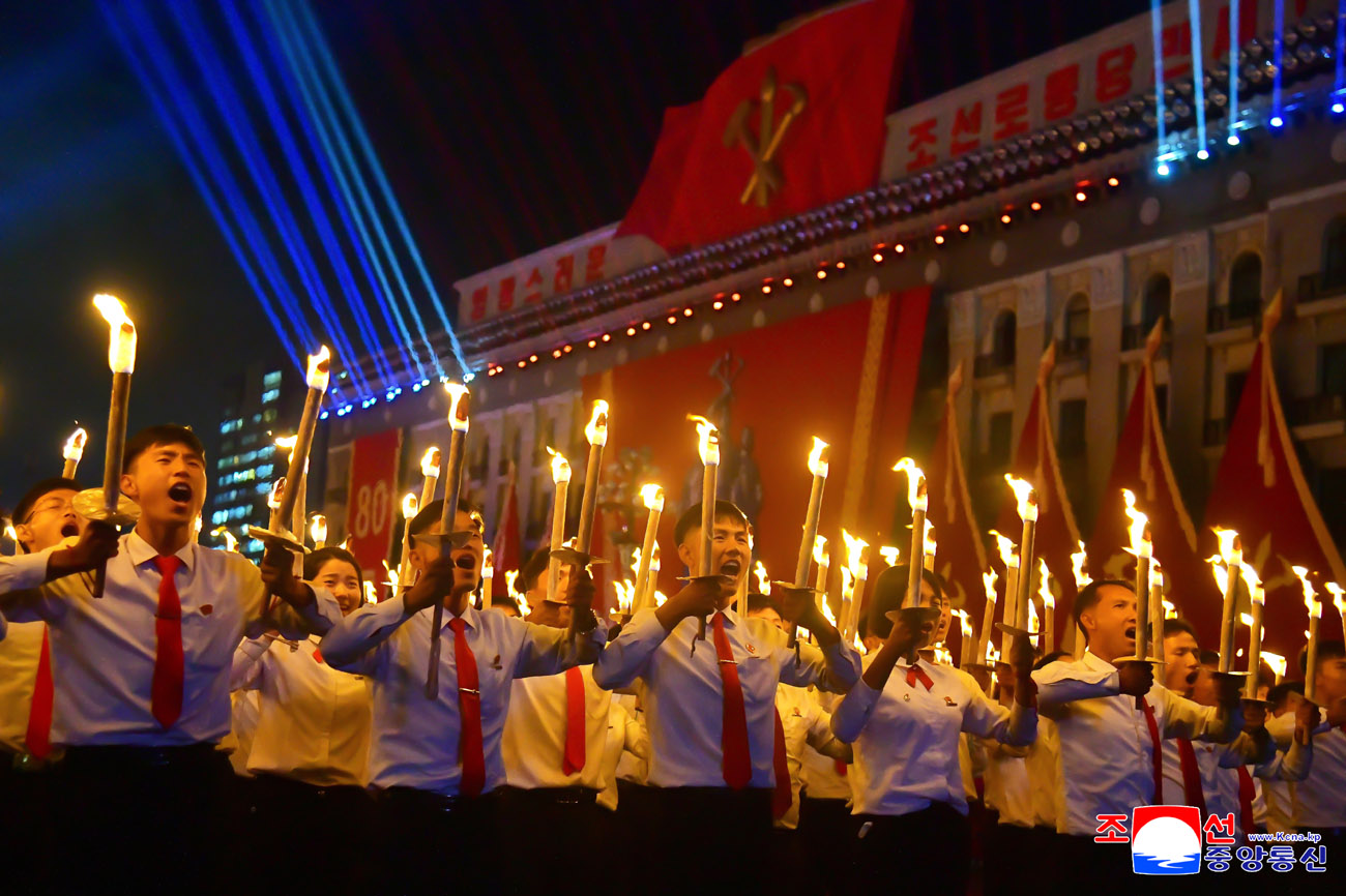 Public procession and torchlight evening gala held to celebrate 80th anniversary of WPK